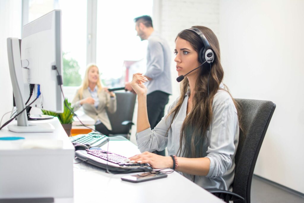 A confused and overwhelmed employee tries to use new software.